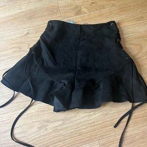 Black suede ruffle hem shorts